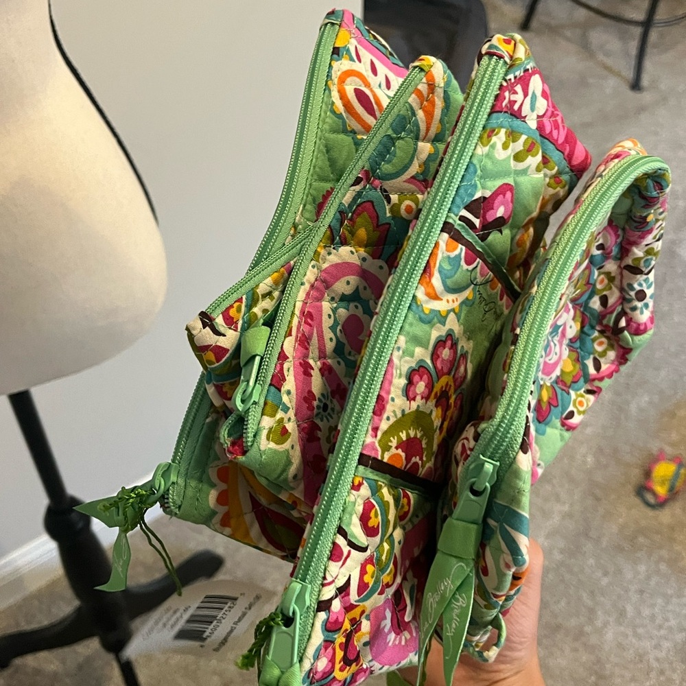 Vera Bradley patterned travel pouches
